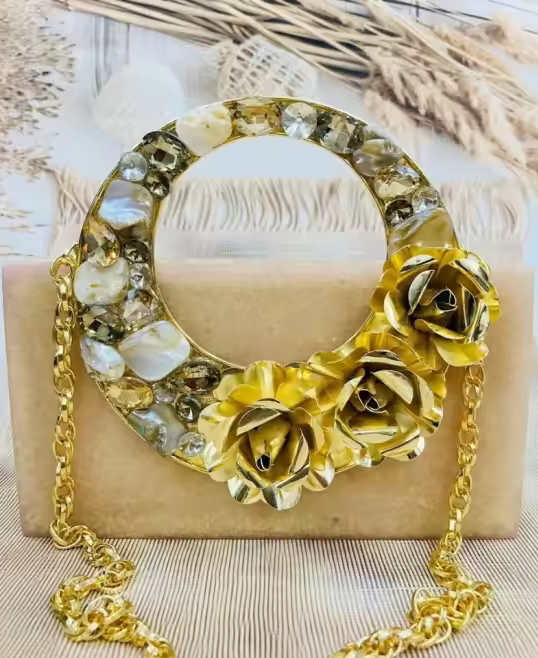 Resin bag with hand crafted roses metallic handle